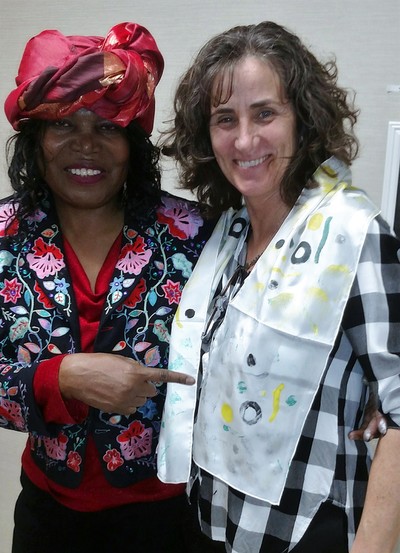 Workshop Participant With Madona Cole-Lacy showing off her handcrafted silk scarf